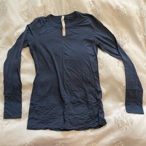 Fitted long sleeve top with banded bottom